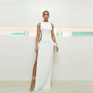 Elegant White Sleeveless Dress with Side Cutouts and Front Slit