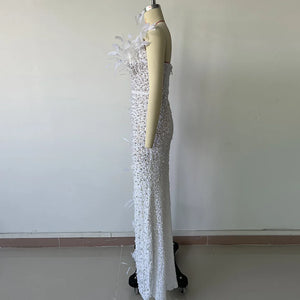 Elegant Strapless Sequin Dress with Pearl Beading, Feather Accents, and Side Split