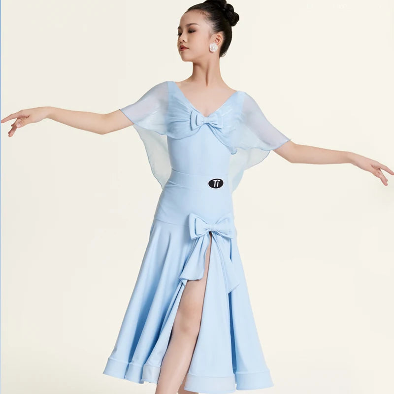 Girls' Light Blue Ballroom Latin Dance Dress with Chiffon Cape Sleeves and Bow Detail