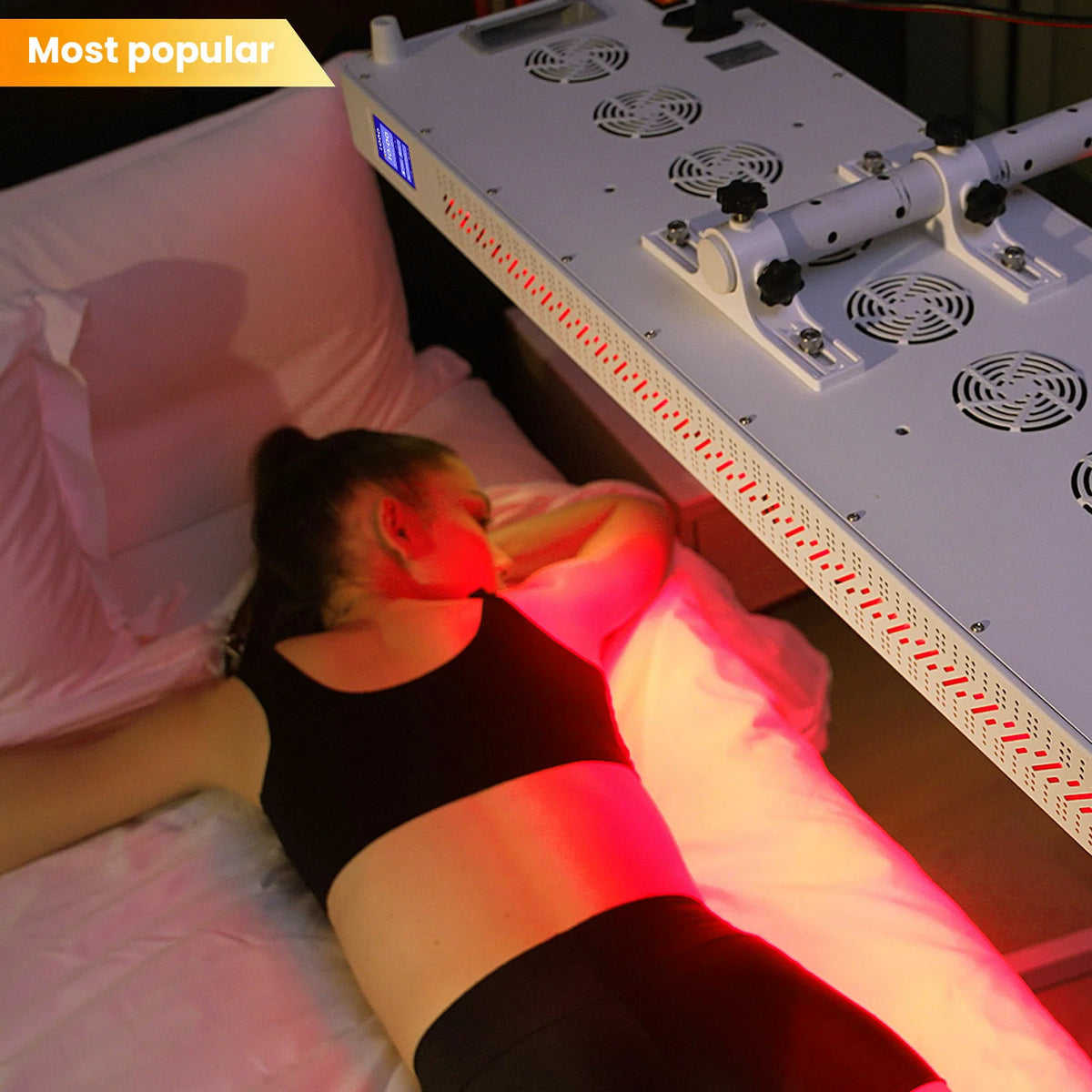 Person using the RL300MAX red light therapy panel