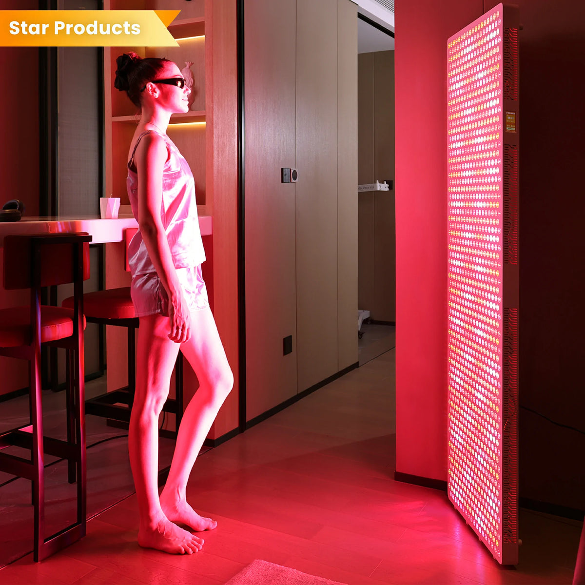 Person using the RLPRO2000 red light therapy panel