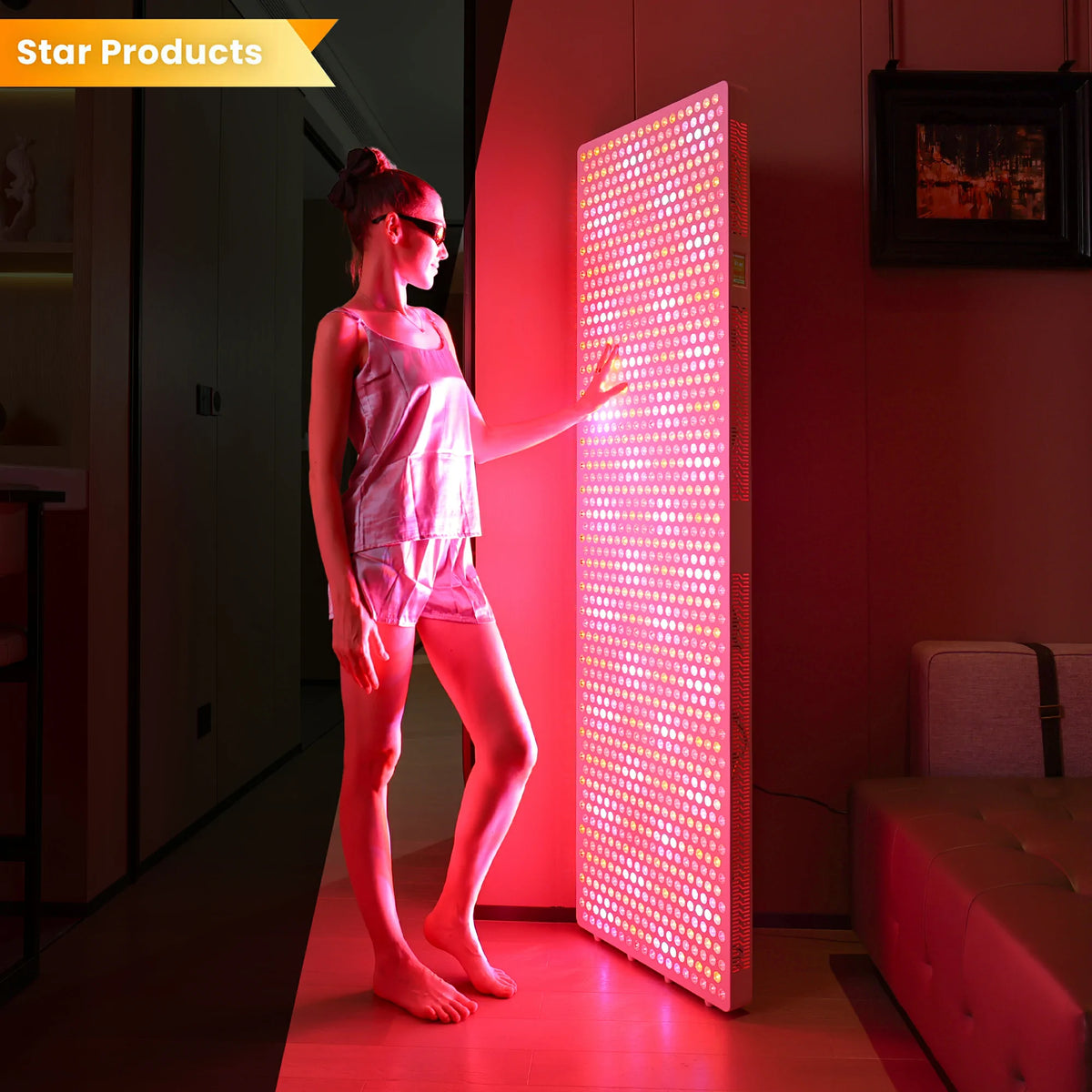 Person using the RLPRO2000 red light therapy panel