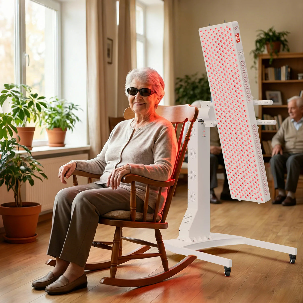 Person using the RLUltra450MAX red light therapy panel