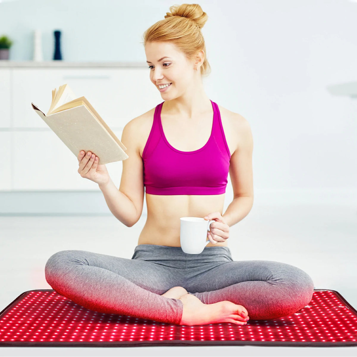 Person using the TLB600 red light therapy pad