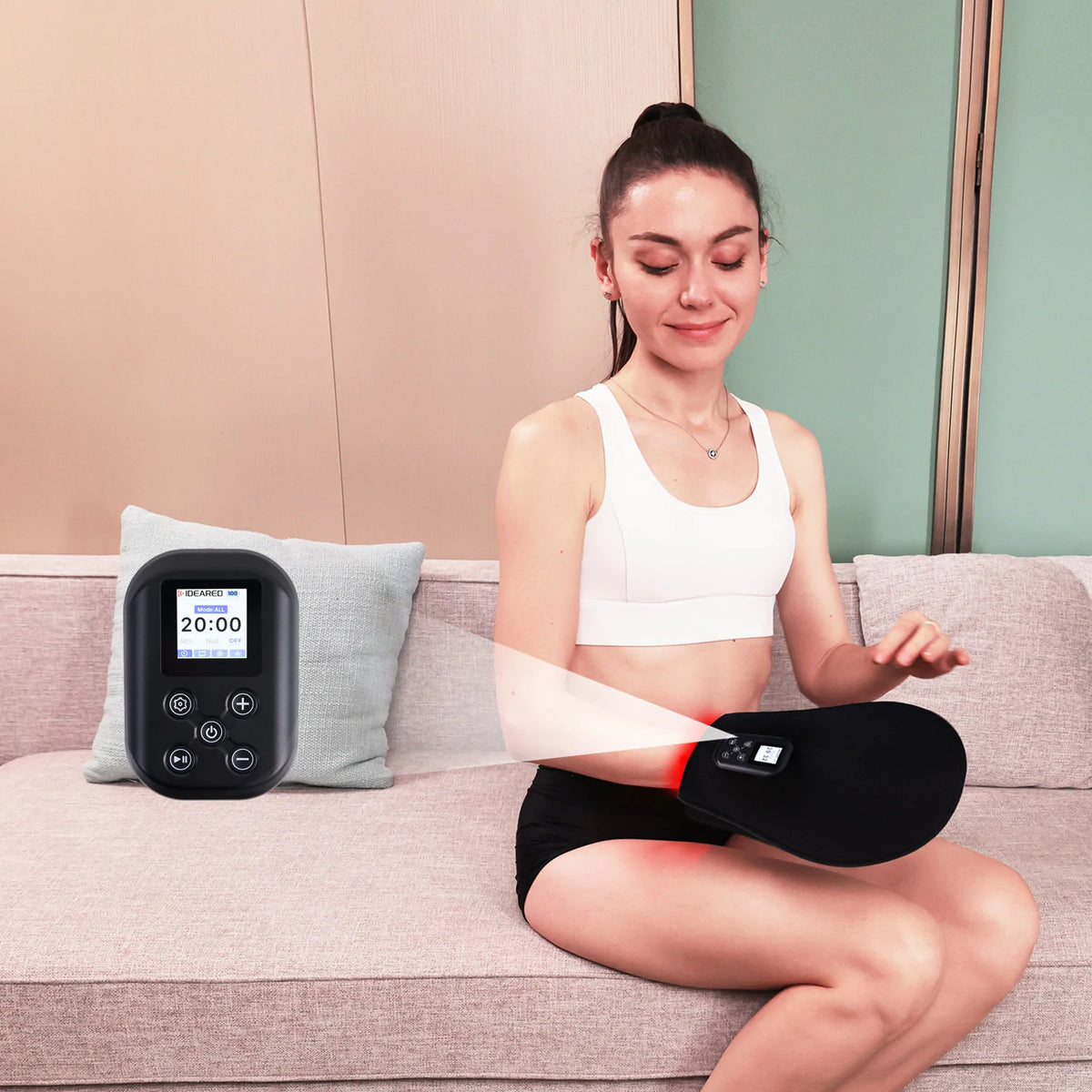 Person using the TLH200-C4 red light therapy gloves